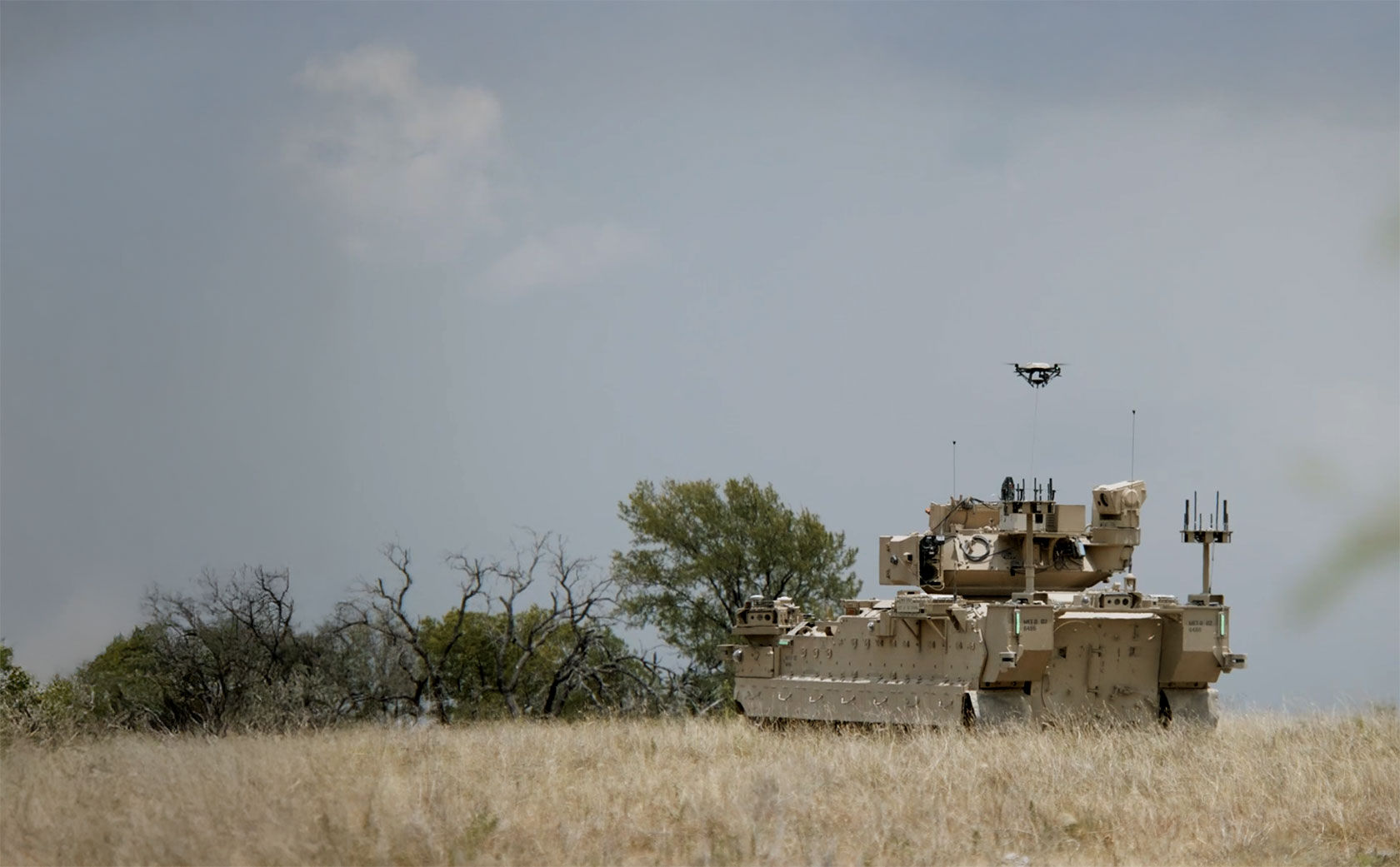 Hoverfly tethered unmanned aerial system (TeUAS) deployed from a military vehicle